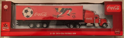 10203-1 € 22,50 coca cola vrachtwagen truck ijzer oplegger plastic afb voetbal ca 31 cm.jpeg